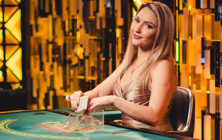 Enjoy the company of a blond dealer girl while playing poker.